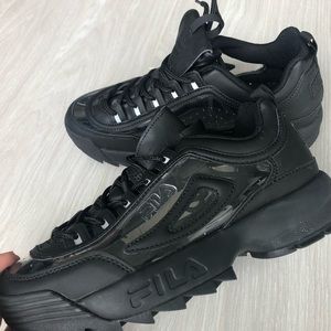 Black and Clear Fila Disruptors